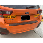 TOTOMO two Student Driver magnets installed on an orange vehicle